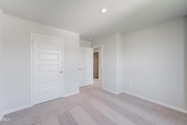124 Landon Pl, Roxboro, NC 27573 - unfurnished bedroom featuring baseboards, carpet flooring, and recessed lighting