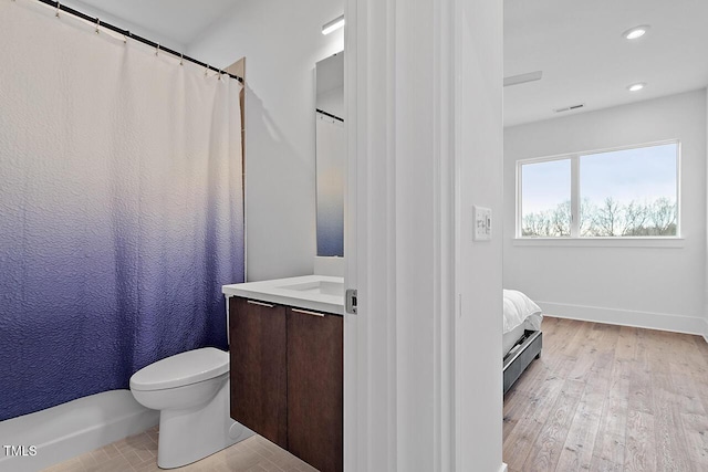 full bathroom with vanity, toilet, recessed lighting, wood finished floors, and a shower with shower curtain