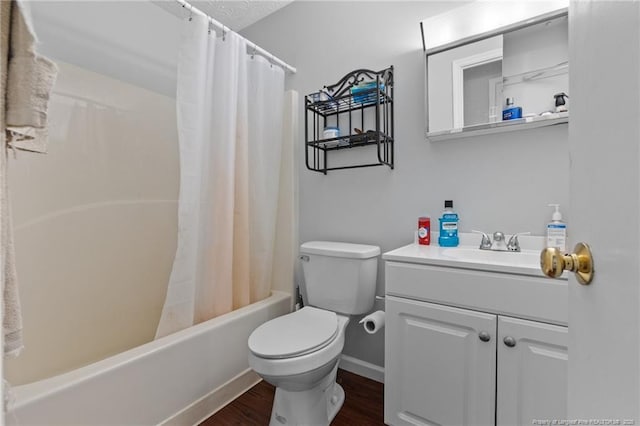 full bathroom featuring vanity, toilet, wood finished floors, and shower / bath combination with curtain