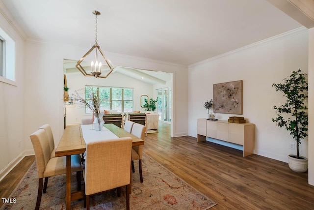 151 Monteith Dr, Chapel Hill, NC 27516 - dining room with a chandelier, wood finished floors, crown molding, and baseboards