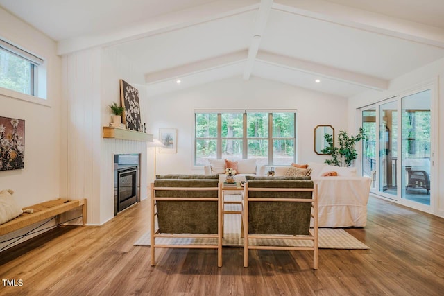 151 Monteith Dr, Chapel Hill, NC 27516 - living area with wood finished floors, a glass covered fireplace, and recessed lighting