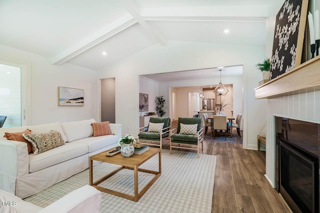 151 Monteith Dr, Chapel Hill, NC 27516 - living room with a glass covered fireplace, wood finished floors, baseboards, and recessed lighting