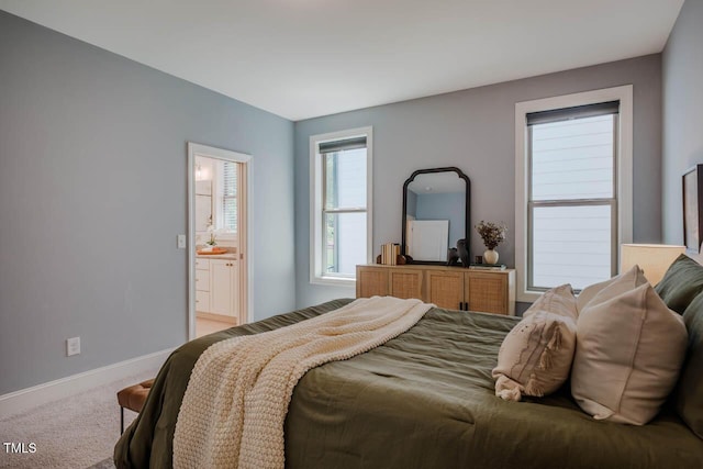 151 Monteith Dr, Chapel Hill, NC 27516 - carpeted bedroom with baseboards and ensuite bath