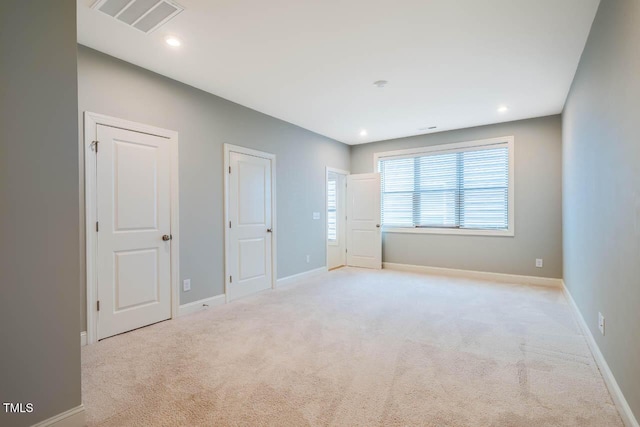 151 Monteith Dr, Chapel Hill, NC 27516 - unfurnished bedroom featuring multiple windows, carpet floors, baseboards, and recessed lighting