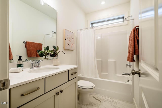 151 Monteith Dr, Chapel Hill, NC 27516 - bathroom featuring marble look tiles, toilet, vanity, shower / bath combo, and recessed lighting