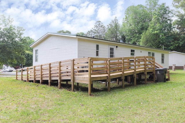 1201 Red Sunset Pl, Siler City, NC 27344 - back of house featuring a deck and a lawn