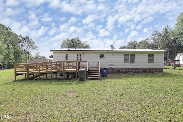 1201 Red Sunset Pl, Siler City, NC 27344 - back of house with a lawn, a deck, metal roof, and crawl space