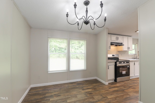 1201 Red Sunset Pl, Siler City, NC 27344 - kitchen featuring stainless steel range with electric stovetop, a notable chandelier, white cabinets, dark wood-style flooring, and under cabinet range hood