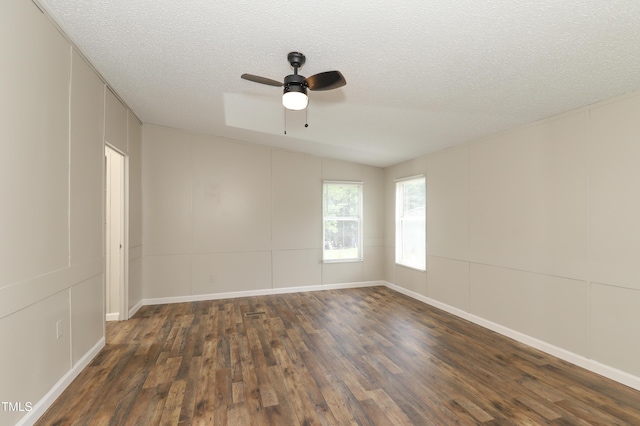 1201 Red Sunset Pl, Siler City, NC 27344 - unfurnished room with ceiling fan, a textured ceiling, a decorative wall, and wood finished floors