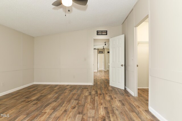 1201 Red Sunset Pl, Siler City, NC 27344 - unfurnished room featuring a ceiling fan, baseboards, a textured ceiling, and wood finished floors