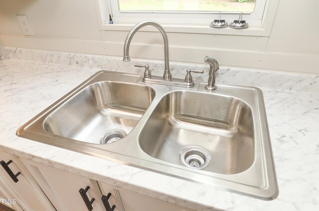 1201 Red Sunset Pl, Siler City, NC 27344 - room details with light stone countertops and a sink