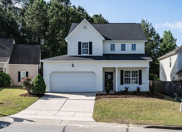 traditional-style home featuring concrete driveway and covered porch