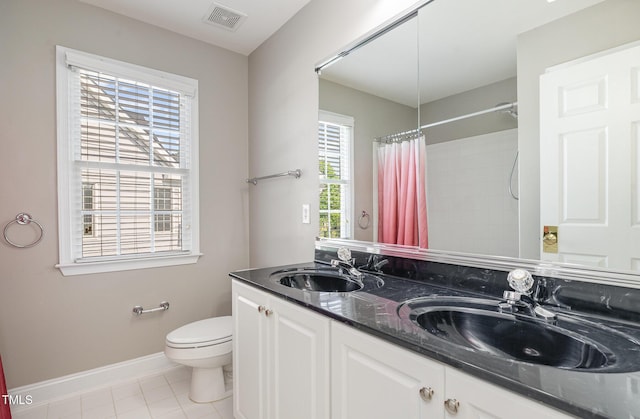 full bathroom with baseboards, visible vents, a sink, and tile patterned flooring