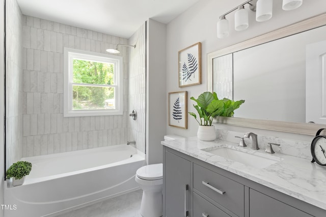 full bath featuring toilet,  shower combination, and vanity