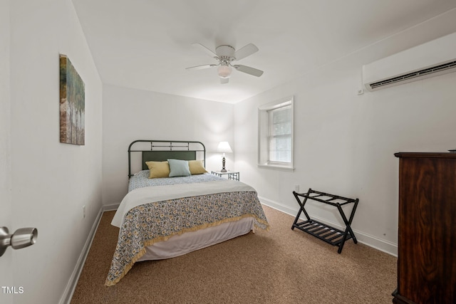 carpeted bedroom with baseboards, ceiling fan, and a wall mounted air conditioner