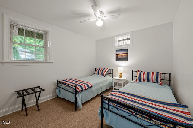 bedroom featuring carpet flooring, baseboards, and ceiling fan