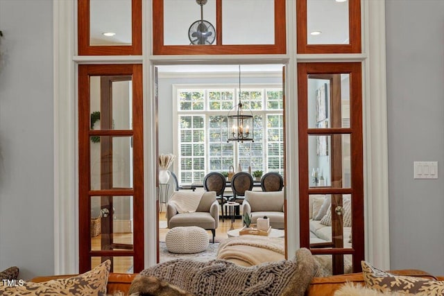 entryway featuring a chandelier