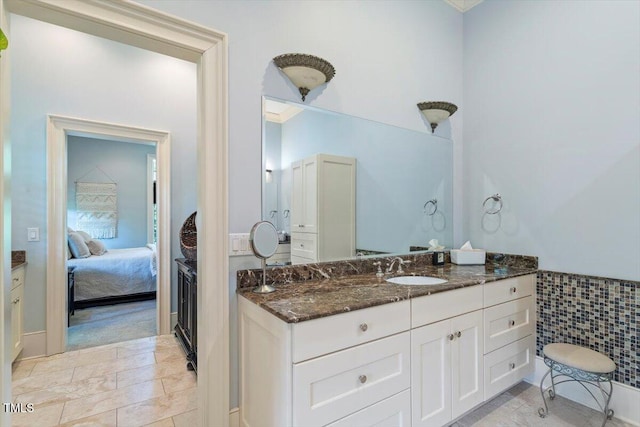 bathroom featuring vanity and connected bathroom