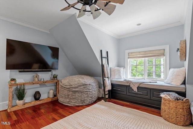 bedroom with wood finished floors, ornamental molding, and ceiling fan