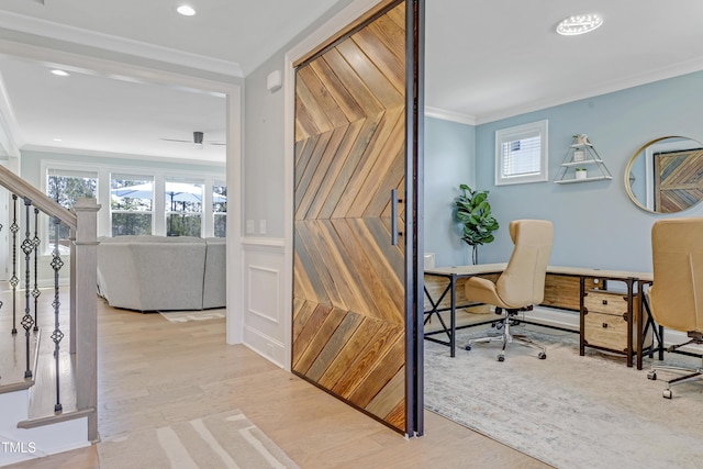 office space featuring crown molding, recessed lighting, plenty of natural light, and wood finished floors