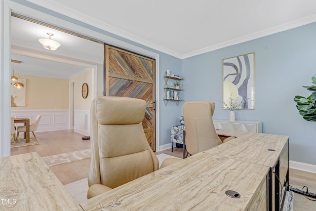 office space featuring crown molding and wood finished floors