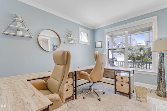 office area with crown molding and baseboards