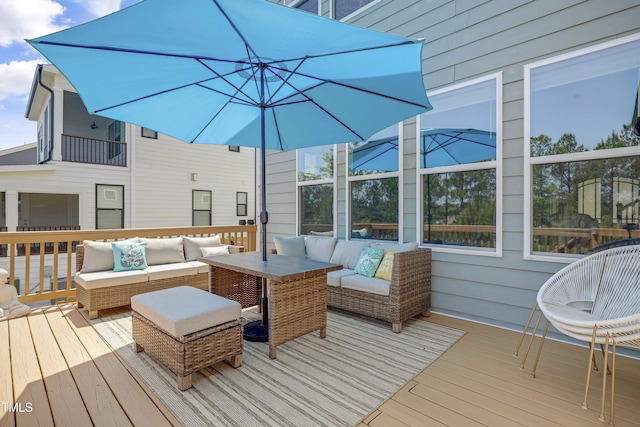 deck with an outdoor hangout area