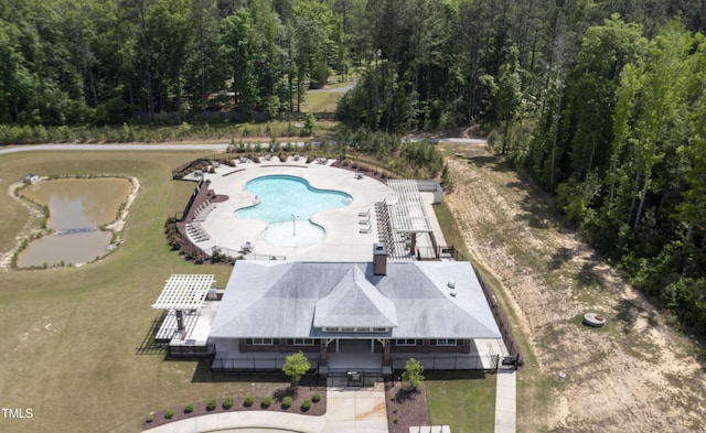 drone / aerial view with a forest view