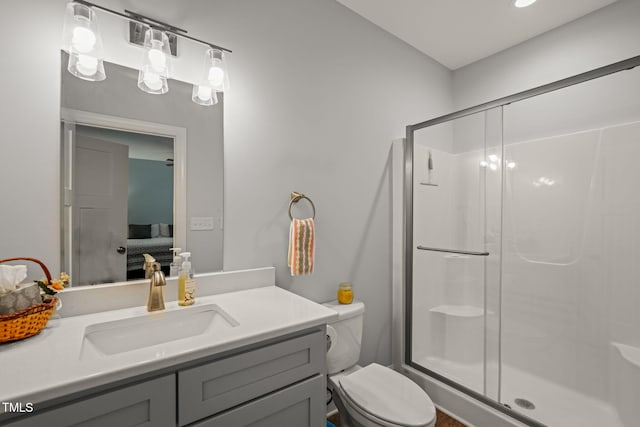 bathroom with vanity, ensuite bath, and a stall shower