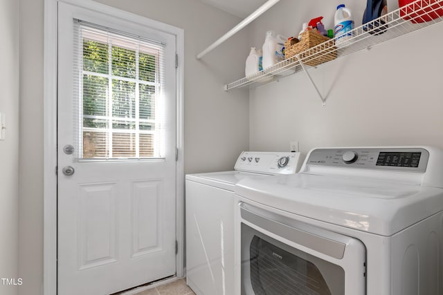 laundry area with laundry area and washing machine and dryer