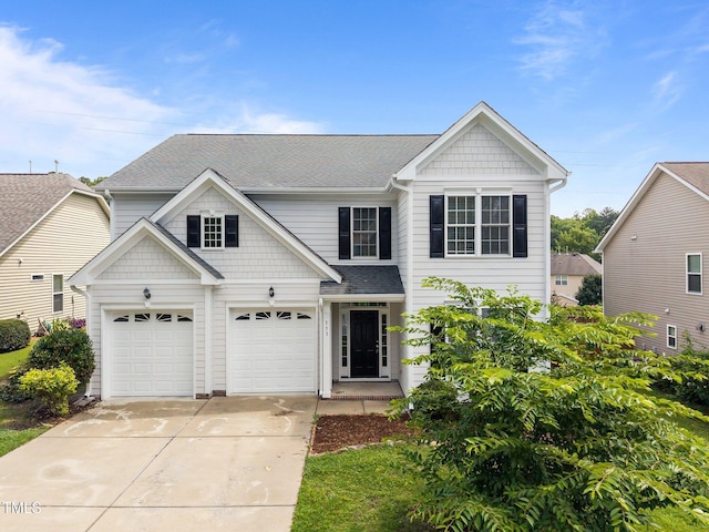 333 Trout Valley Rd, Wake Forest, NC 27587 - view of front facade featuring concrete driveway and a shingled roof