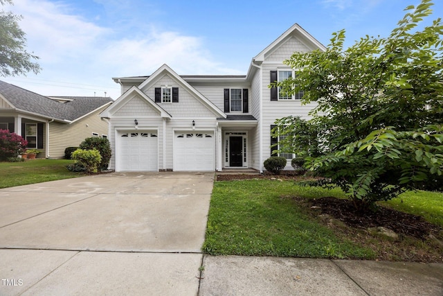 333 Trout Valley Rd, Wake Forest, NC 27587 - view of front facade with concrete driveway, an attached garage, and a front yard