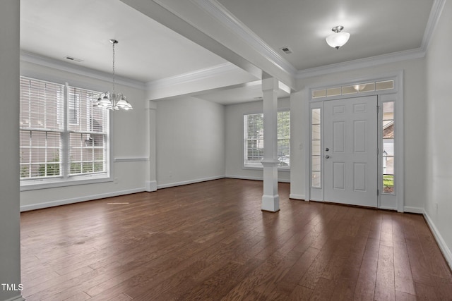 333 Trout Valley Rd, Wake Forest, NC 27587 - foyer with ornate columns, dark wood-style floors, a chandelier, and crown molding