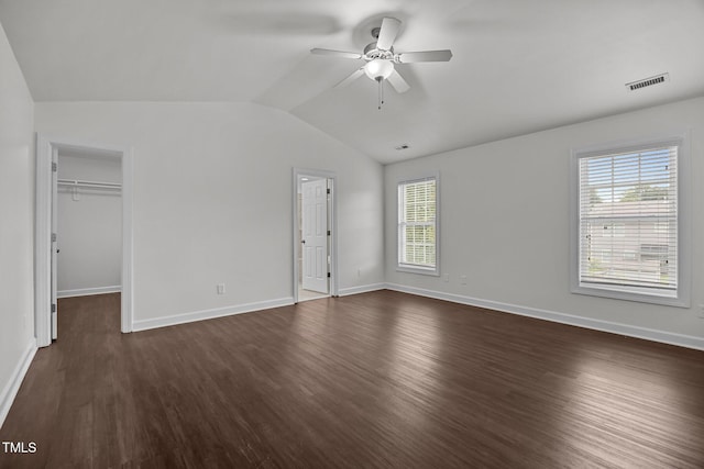 333 Trout Valley Rd, Wake Forest, NC 27587 - unfurnished bedroom with multiple windows, lofted ceiling, and dark wood-style floors