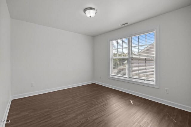 333 Trout Valley Rd, Wake Forest, NC 27587 - empty room with dark wood finished floors and baseboards
