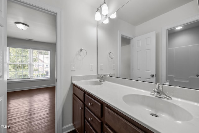 333 Trout Valley Rd, Wake Forest, NC 27587 - full bathroom featuring double vanity and wood finished floors