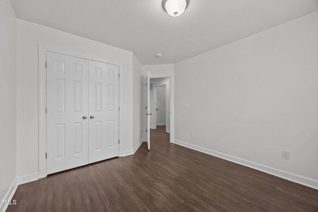 333 Trout Valley Rd, Wake Forest, NC 27587 - unfurnished bedroom with dark wood finished floors and a closet