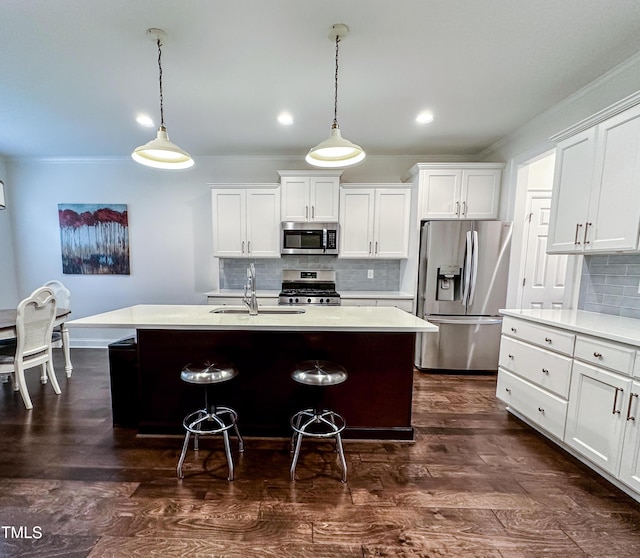 409 Eagle Ct, Henderson, NC 27536 - kitchen with light countertops, a sink, backsplash, and stainless steel appliances