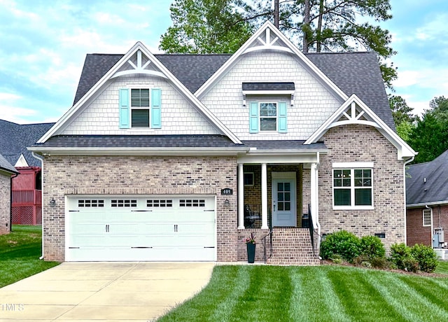 409 Eagle Ct, Henderson, NC 27536 - craftsman inspired home with a front yard, concrete driveway, brick siding, and a garage