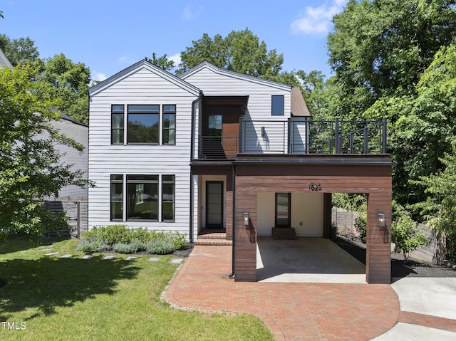 1820 Park Dr, Raleigh, NC 27605 - view of front of house with a balcony and a front lawn