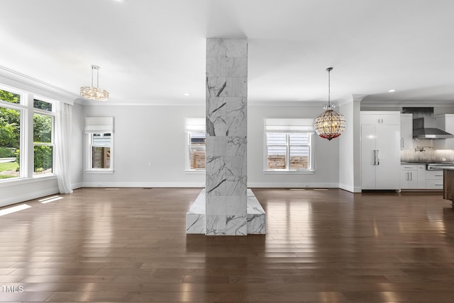 1820 Park Dr, Raleigh, NC 27605 - unfurnished living room with a chandelier, crown molding, dark wood-style flooring, baseboards, and recessed lighting