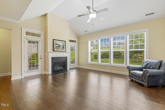 624 Meadowgrass Ln, Wake Forest, NC 27587 - living room with vaulted ceiling, a glass covered fireplace, a ceiling fan, dark wood finished floors, and baseboards