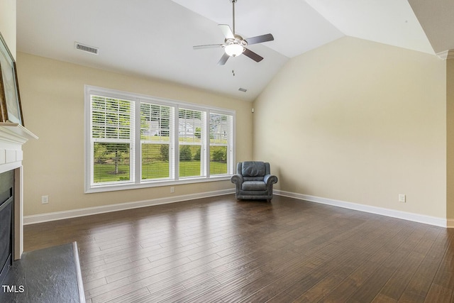 624 Meadowgrass Ln, Wake Forest, NC 27587 - unfurnished room with lofted ceiling, ceiling fan, a fireplace with flush hearth, dark wood finished floors, and baseboards