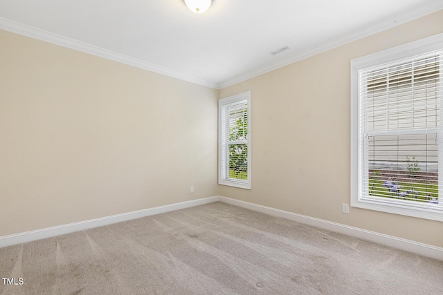 624 Meadowgrass Ln, Wake Forest, NC 27587 - empty room featuring ornamental molding, baseboards, and light carpet