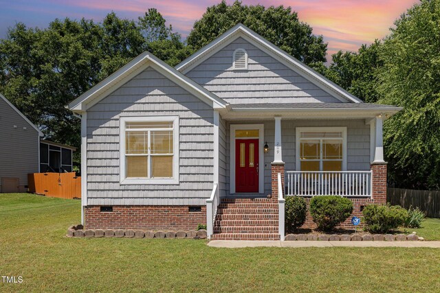 209 Mccarthy Dr, Clayton, NC 27527 - view of front facade featuring crawl space and covered porch