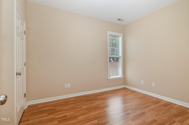 209 Mccarthy Dr, Clayton, NC 27527 - unfurnished room with light wood-style floors and baseboards