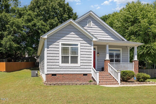 209 Mccarthy Dr, Clayton, NC 27527 - bungalow-style home with crawl space, covered porch, and central AC unit