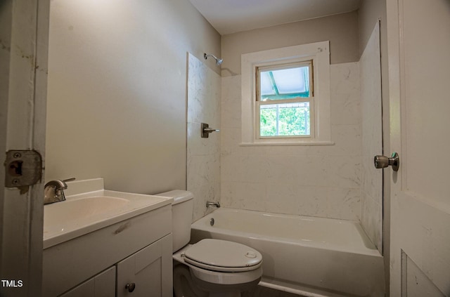 full bathroom with toilet, vanity, and tub / shower combination