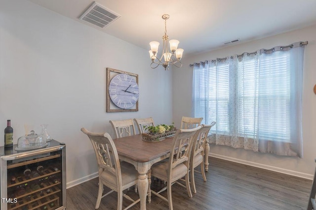 79 Hawkstone Dr, Clayton, NC 27527 - dining space featuring wine cooler, baseboards, a notable chandelier, and visible vents