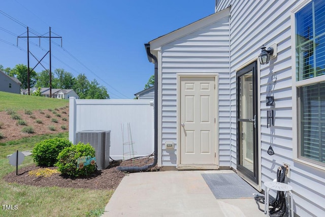 79 Hawkstone Dr, Clayton, NC 27527 - entrance to property with cooling unit and a patio area